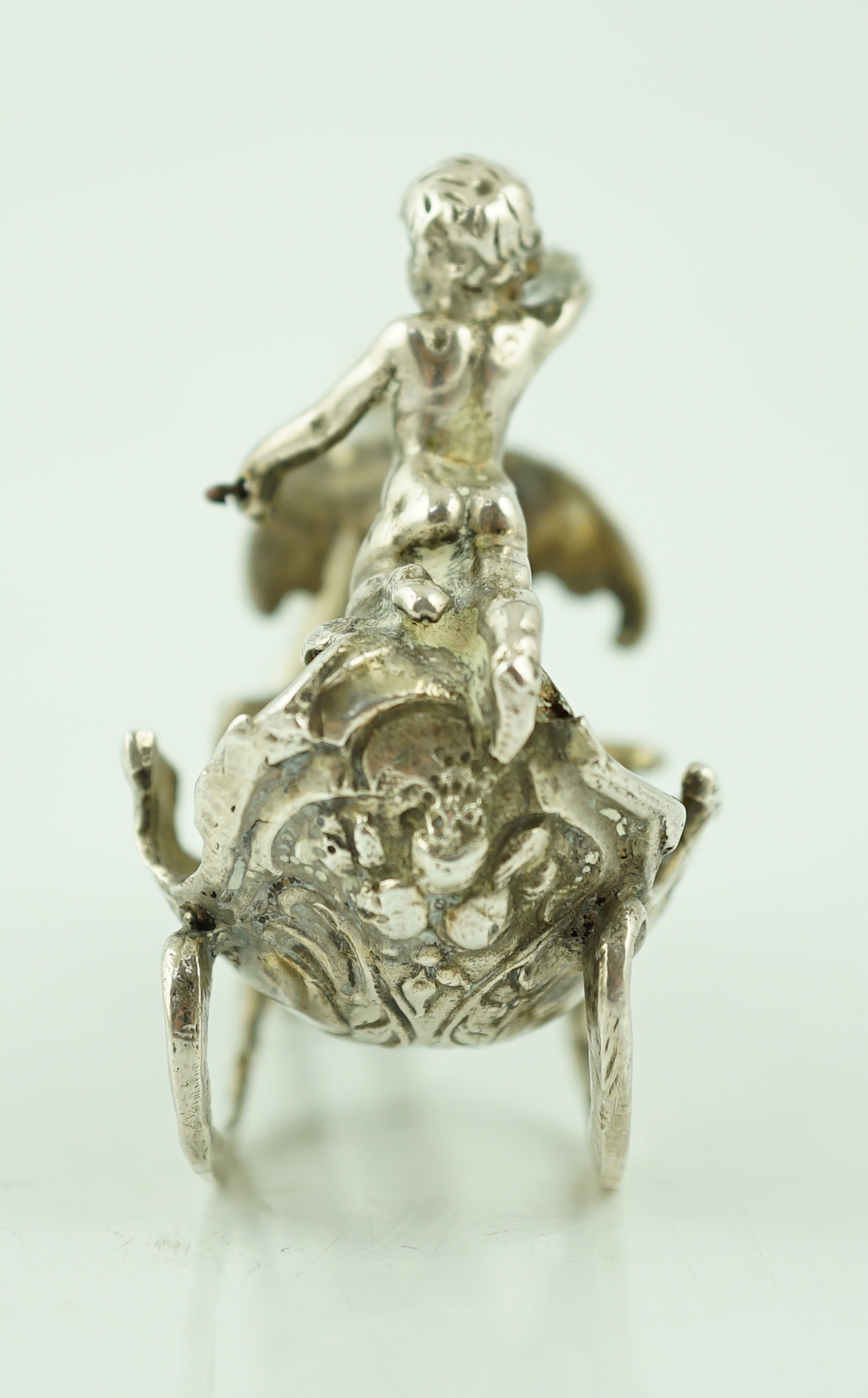 A late 19th century silver miniature model of a horse driven sleigh, with putto, import marks for Berthold Muller